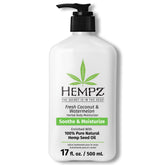 Hempz body lotion fresh coconut and watermelon bottle sits on bathroom shelf for daily hydration.