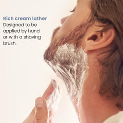 Henson Shaving travel-size bottle emphasizes carry-on friendly packaging.