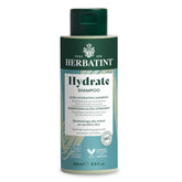 Herbatint Hydrate Shampoo bottle shows hydration-ready formula for thirsty hair.