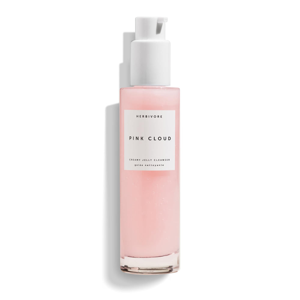 HERBIVORE Pink Cloud Cleanser bottle dispensing, gentle makeup removal and hydration.