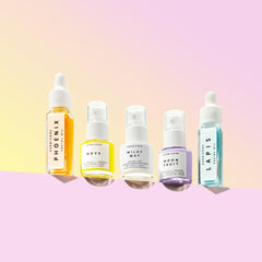 HERBIVORE Rainbow Minis Set Lapis oil bottle—color-rich hydration for calm, even-toned skin.