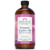 HERITAGE STORE Organic Castor Oil bottle in glass emphasizes hair conditioning potential.