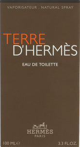 Hermès Terre D'Hermes bottle close-up signals earthy, confident daily wear.