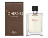 Hermès Terre d’Hermès bottle close-up showing rugged confidence for daytime wear.