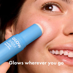 Hero Cosmetics Glow Balm on dry spots reduces dullness, adds radiant warmth.
