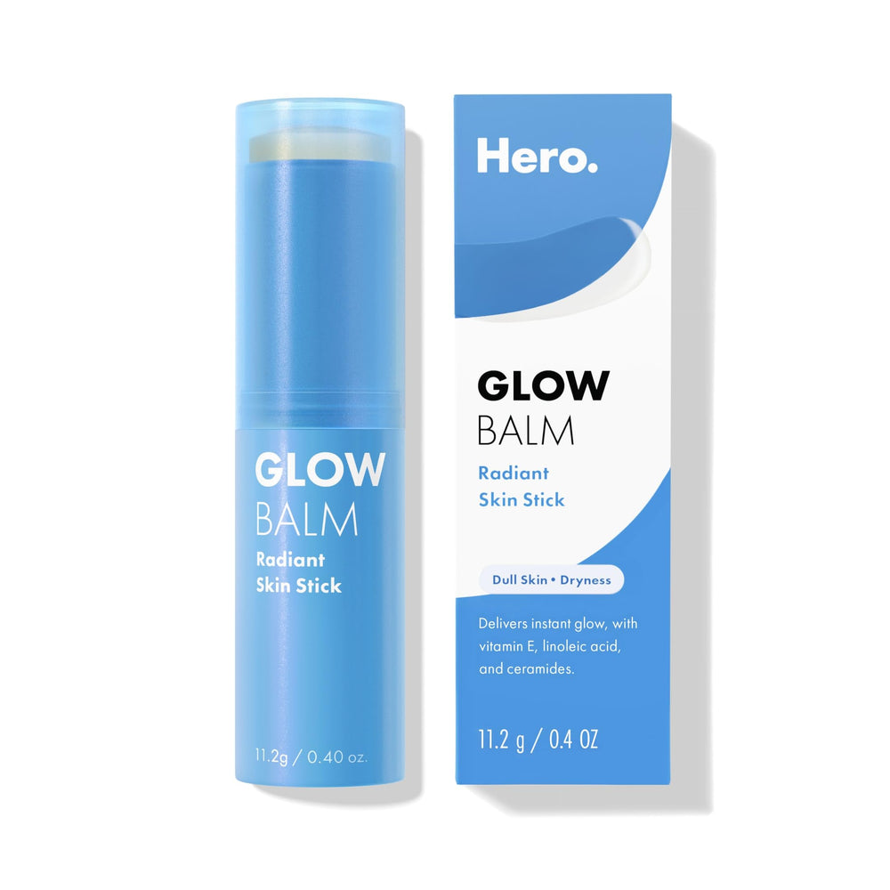 Hero Cosmetics Glow Balm Radiant Skin Stick applied on cheeks for instant glow.