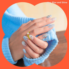Heyhae blue gel strips close-up with glitter and stars for chic nails.
