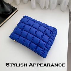 HFLZBRO Puffy quilted makeup bag blue top zipper keeps items secure.