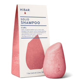 HIBAR Curl Shampoo Bar bottle pour demonstrates plastic-free cleansing for curly hair.