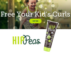 Hip Peas curl tamer application on damp hair for detangling and curl shaping.