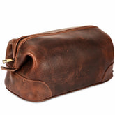 HLC Leather Toiletry Bag close-up shows premium texture for durable travel