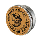 Honest Amish beard balm twist tin close-up showing all-natural ingredients for softer beard