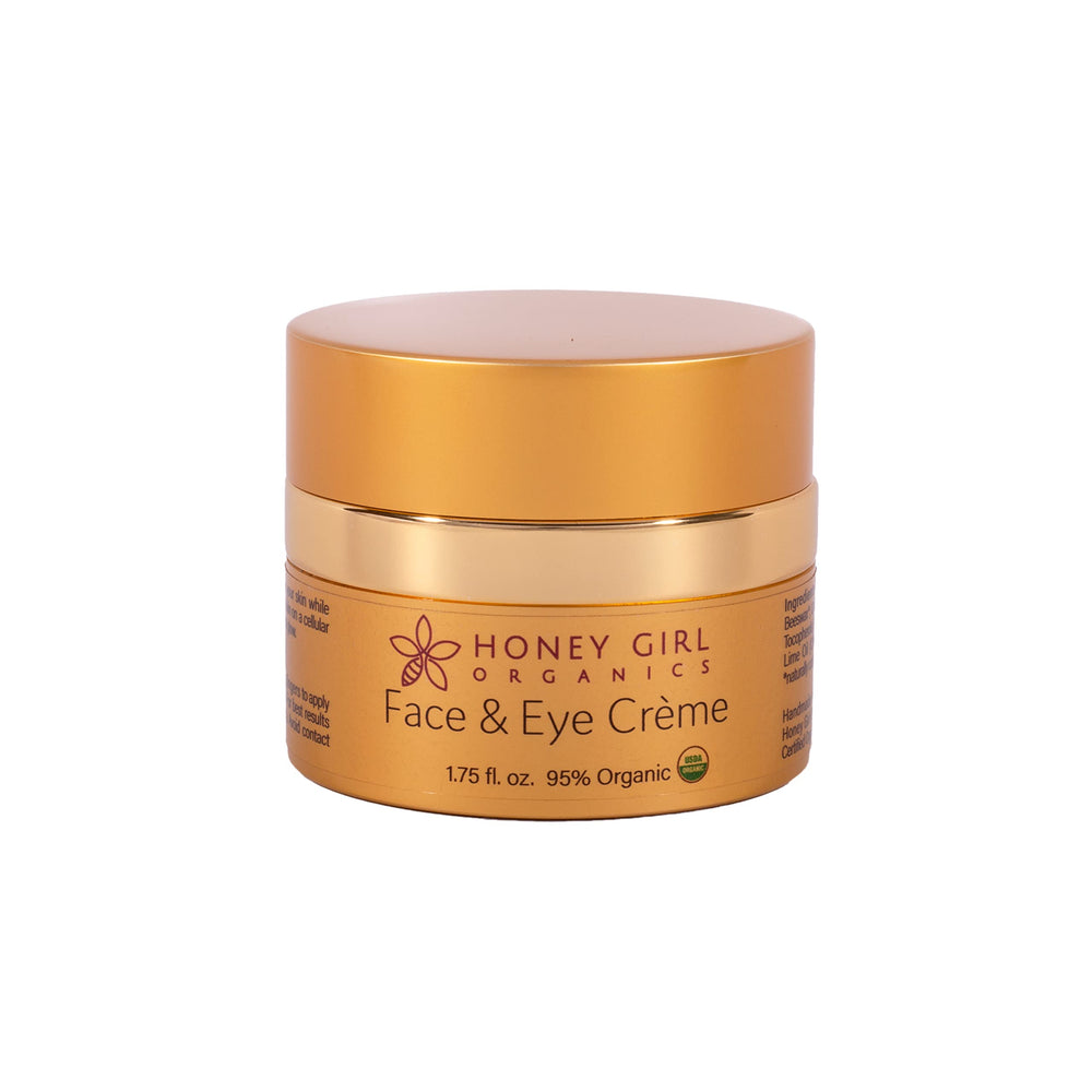 Honey Girl Organics Face & Eye Creme packaging highlights organic ingredients for daily hydration.