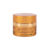 Honey Girl Organics Face & Eye Creme packaging highlights organic ingredients for daily hydration.