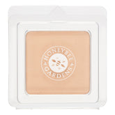 Honeybee Gardens pressed mineral powder refill in luminous shade ready for on-the-go touch-ups
