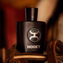 HOOEY cologne bottle with magnetic top for easy premium application.