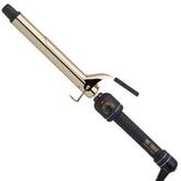 Hot Tools Pro Artist 24K Gold curling iron barrel close-up shows defined curls