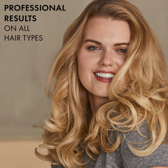 Hot Tools Pro Artist curling iron wand shows no-stick glide for easy use.