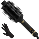 Hot Tools Pro Artist Oval Brush close-up with adjustable heat settings for customizable styling.