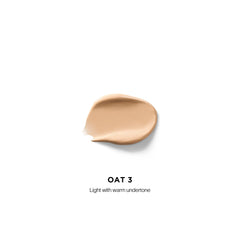 Hourglass Vanish Airbrush Concealer wand close-up demonstrates seamless natural finish.