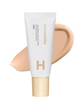 Hourglass Veil Hydrating Skin Tint bottle close-up for dewy glow and hydration.