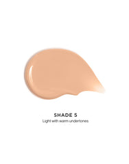 Hourglass Veil Hydrating Skin Tint swatch on skin shows dewy, natural-looking coverage