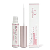 House of Lashes eyelash glue bottle closeup showing latex-free formula for sensitive eyes