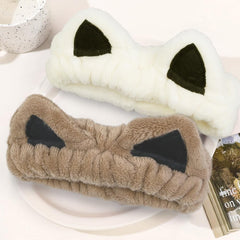 Huachi cat spa headband in bathroom setup for skincare routine.