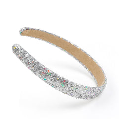 Detalle dorado de Huachi, diadema iridiscente para ocasiones especiales