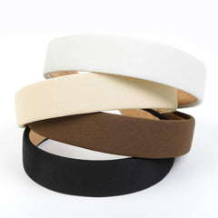 Huachi white headband offers clean versatile look for workouts or workdays.