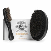 Hunter Jack beard brush close-up featuring natural boar bristles for detangling and shine.