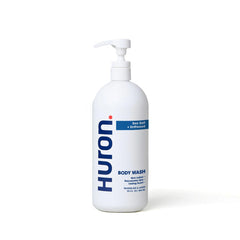 Huron Men Moisturizing Body Wash sea salt bottle view, highlighting refreshing cleanse and hydration.