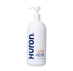 Huron Men’s Body Wash bottle label highlights clean, woodsy scent and vegan formula.