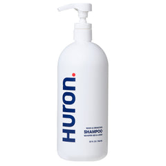Huron Men's Fresh Scent Daily Shampoo bottle promotes a hydrating cleanse for daily use.