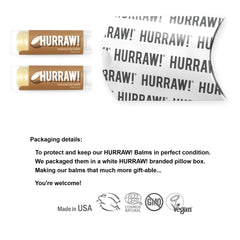 Close-up of Hurraw! coconut lip balm tubes showing smooth glide.