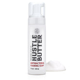 Hustle Bubbles bottle foam-application demonstrates gentle tattoo cleansing during healing.