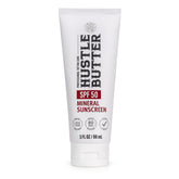 Hustle Butter Deluxe tattoo sunscreen bottle closeup with SPF 50 protection for ink