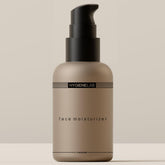 HygieneLab Face Moisturizer bottle closeup demonstrates unscented hydration for all skin types.
