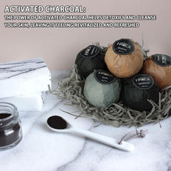 HZEX charcoal bath bombs dissolving in a tub with relaxing essential oil aroma.