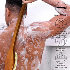ICANdOIT bent-handle shower scrubber showing extended reach to clean the back.