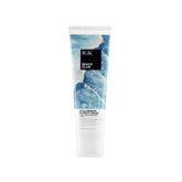 IGK Beach Club Style-Memory Cream packaging highlights a lightweight heat-protectant for voluminous blowouts.