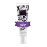 IGK Expensive gloss bottle closeup showing clear, weightless shine for color-rich strands