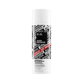 IGK Good Behavior bottle pour demonstrates smooth, frizz-fighting application.