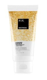 IGK Mistress hydrating hair balm bottle shows lightweight hydration and frizz control.