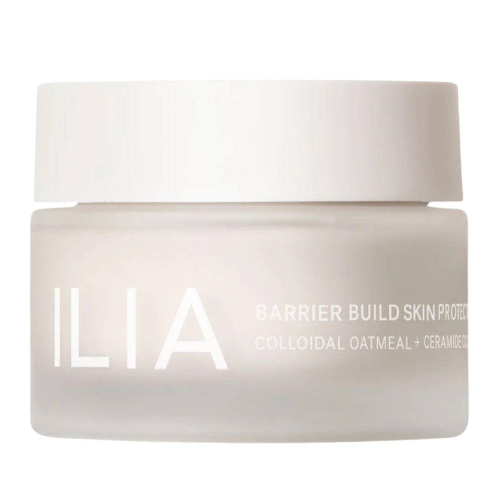 ILIA Barrier Build Cream tube closeup shows creamy texture for soothing hydration.