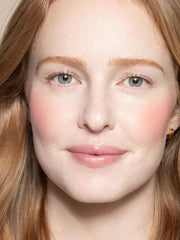 ILIA Multi-Stick Golden Peach shade on skin for warm glow.