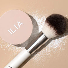 ILIA Soft Focus Setting Powder packaging on dresser for easy daily touch-ups.