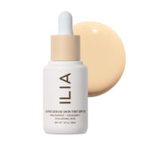 ILIA Super Serum Skin Tint SPF 40 bottle close-up showing dewy lightweight coverage.