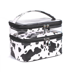 Imerelez double-layer cosmetic bag in cow print; top view for organized makeup.