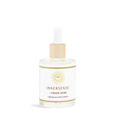INNERSENSE Glossing Serum bottle showcases healthy shine and clean ingredients.
